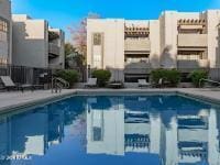 8020 E Thomas Rd Unit 119, Scottsdale, AZ 85251 - view of pool with a patio