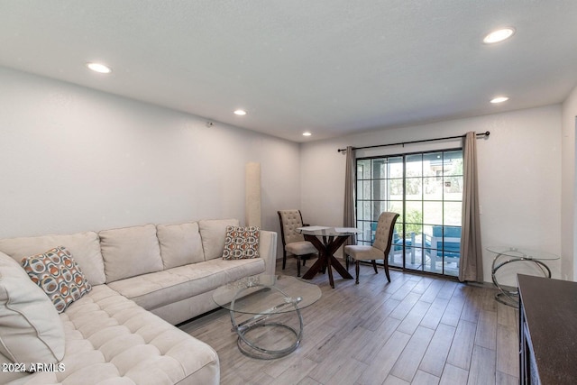 8020 E Thomas Rd Unit 119, Scottsdale, AZ 85251 - living area with recessed lighting and wood finished floors