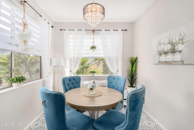 dining room with a chandelier