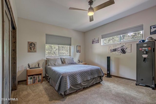 bedroom featuring ceiling fan and carpet floors