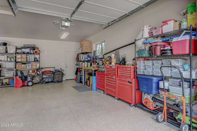 garage featuring a garage door opener