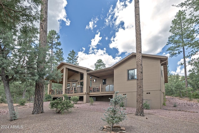 4047 W Forest Ct, Pine, AZ 85544 - rear view of property with a garage and a deck