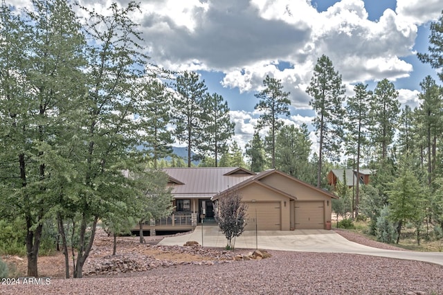 4047 W Forest Ct, Pine, AZ 85544 - ranch-style house with driveway, metal roof, a garage, and a standing seam roof