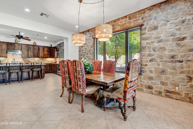 3105 S Amble Pass, Gold Canyon, AZ 85118 - tiled dining space featuring ceiling fan with notable chandelier