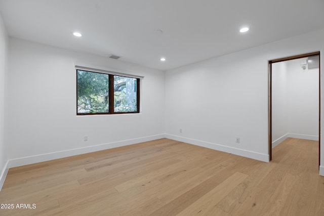 6648 E Horseshoe Rd, Paradise Valley, AZ 85253 - unfurnished room with recessed lighting, baseboards, visible vents, and light wood-style flooring