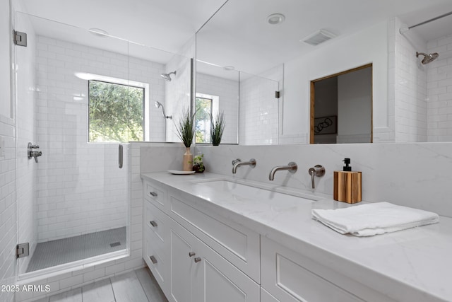 6648 E Horseshoe Rd, Paradise Valley, AZ 85253 - full bathroom featuring vanity, a shower stall, and visible vents