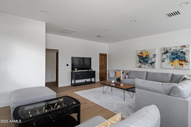 6648 E Horseshoe Rd, Paradise Valley, AZ 85253 - living room featuring recessed lighting, visible vents, and wood finished floors