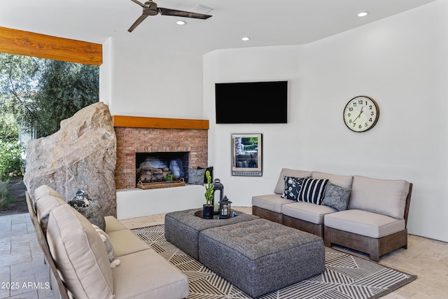 6648 E Horseshoe Rd, Paradise Valley, AZ 85253 - living area featuring ceiling fan, a brick fireplace, recessed lighting, and stone tile floors