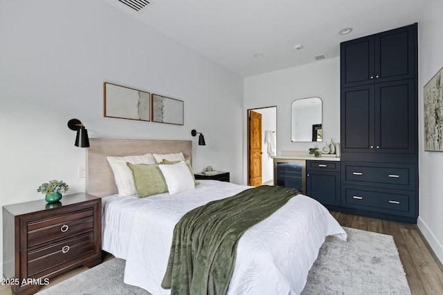 6648 E Horseshoe Rd, Paradise Valley, AZ 85253 - bedroom featuring visible vents and dark wood-style flooring