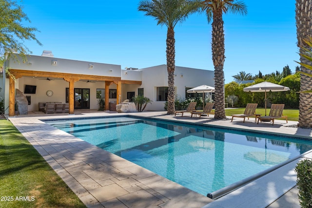 6648 E Horseshoe Rd, Paradise Valley, AZ 85253 - outdoor pool featuring a lawn, a ceiling fan, an outdoor hangout area, and a patio area