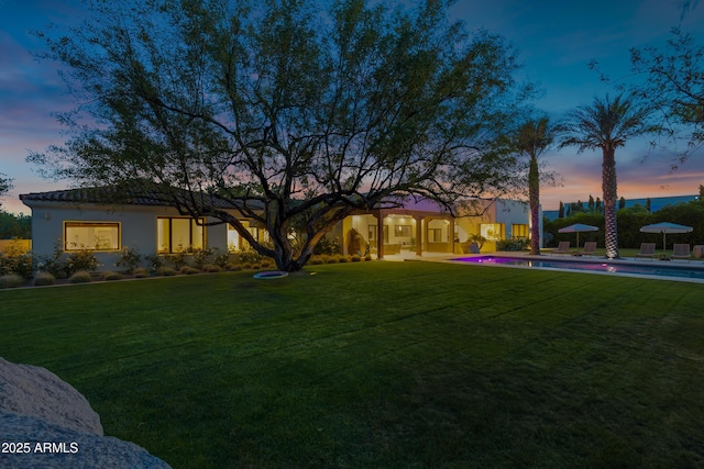 6648 E Horseshoe Rd, Paradise Valley, AZ 85253 - yard at dusk featuring an outdoor pool
