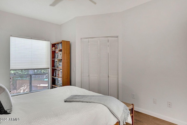 101 N 7th St Unit 225, Phoenix, AZ 85034 - bedroom with wood finished floors, a closet, and ceiling fan