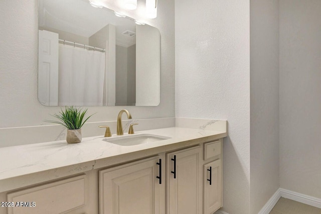 101 N 7th St Unit 225, Phoenix, AZ 85034 - full bathroom with vanity and baseboards