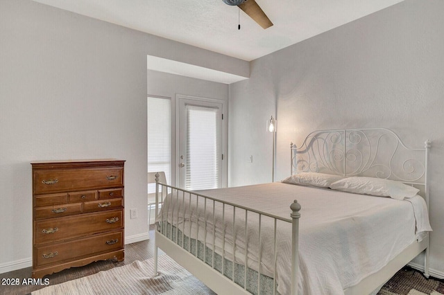 101 N 7th St Unit 225, Phoenix, AZ 85034 - bedroom featuring baseboards and ceiling fan