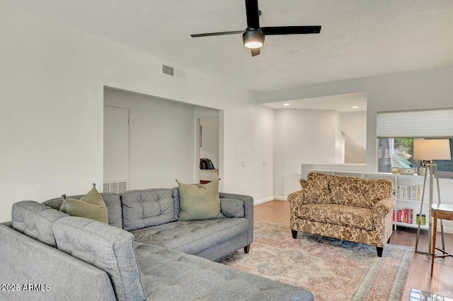 101 N 7th St Unit 225, Phoenix, AZ 85034 - living area featuring wood finished floors and ceiling fan