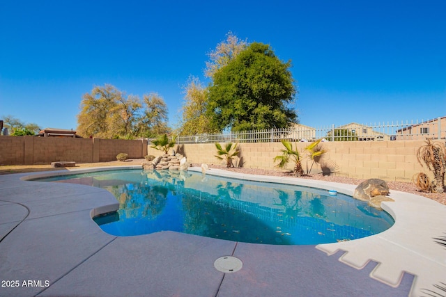 view of pool featuring a fenced backyard and a fenced in pool