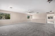 unfurnished living room featuring baseboards