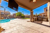 view of patio / terrace with a fenced in pool and a fenced backyard