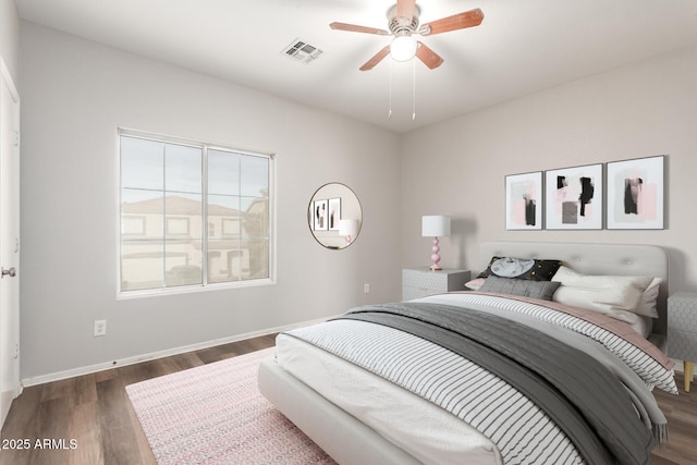 bedroom featuring dark wood-type flooring and ceiling fan