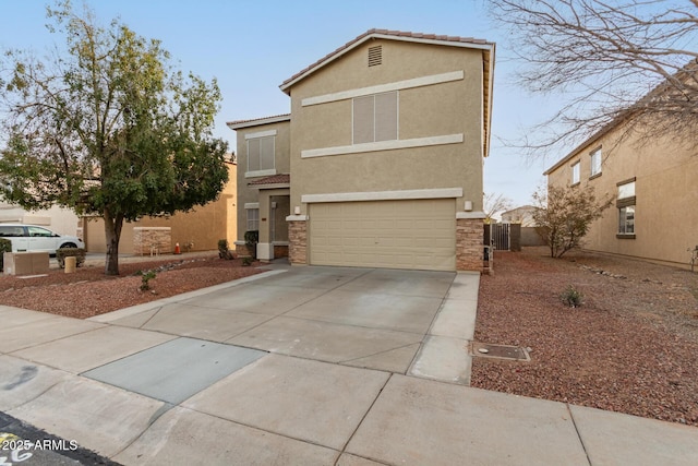 view of front of home with a garage