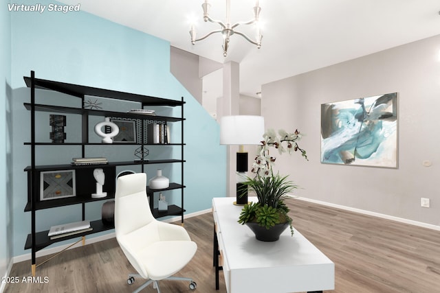 office area with wood-type flooring and a chandelier