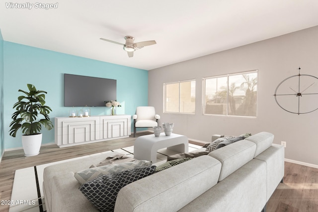 living room with hardwood / wood-style floors and ceiling fan