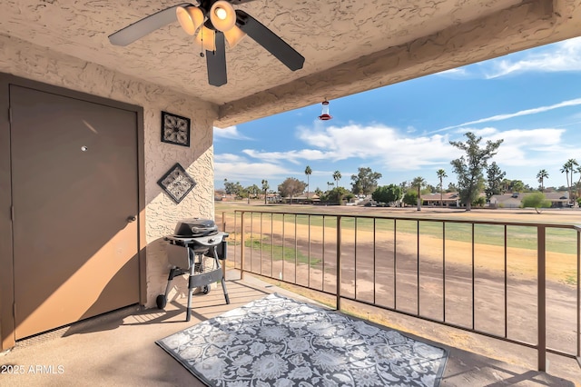 view of patio / terrace featuring grilling area and a ceiling fan