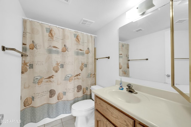 bathroom featuring toilet, visible vents, and vanity