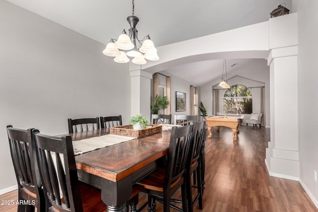 dining room featuring billiards, wood finished floors, arched walkways, an inviting chandelier, and lofted ceiling