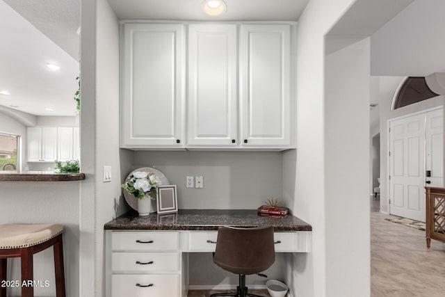 home office featuring recessed lighting and built in study area