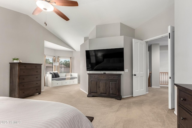 bedroom featuring baseboards, lofted ceiling, light colored carpet, and ceiling fan