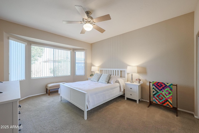 bedroom with ceiling fan and carpet flooring