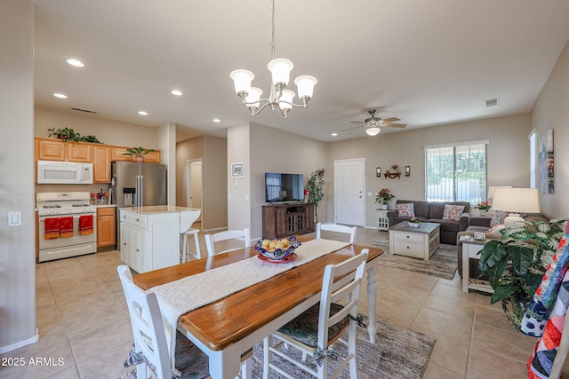 dining space with light tile patterned flooring and ceiling fan with notable chandelier