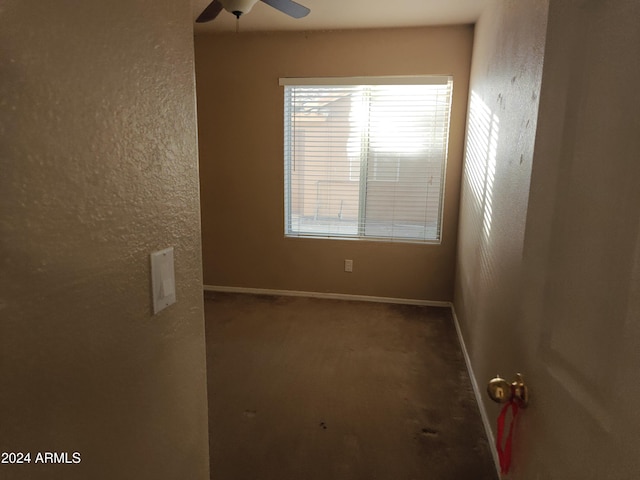 unfurnished room with ceiling fan