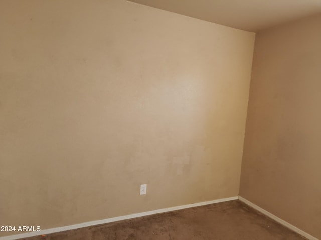 empty room with carpet flooring