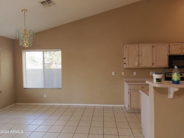 kitchen with stove, high vaulted ceiling, hanging light fixtures, light tile patterned flooring, and a chandelier