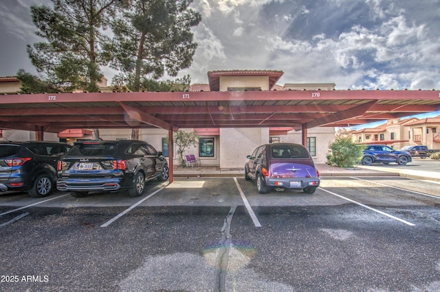 view of car parking featuring a carport