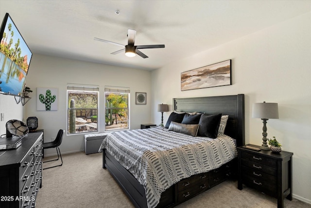 19700 N 76th St Unit 2086, Scottsdale, AZ 85255 - bedroom featuring baseboards, a ceiling fan, and light colored carpet