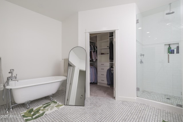 bathroom featuring separate shower and tub