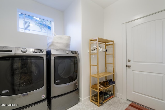 washroom with washer and clothes dryer