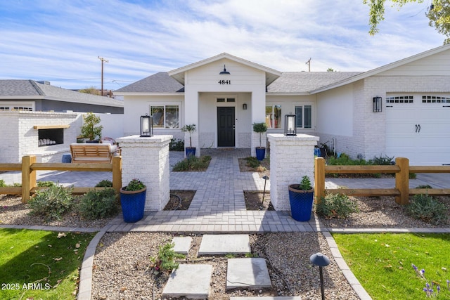 view of front of home featuring a garage