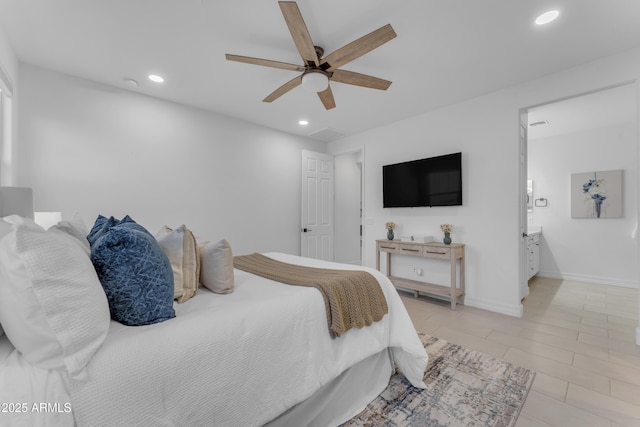 bedroom featuring ceiling fan and connected bathroom