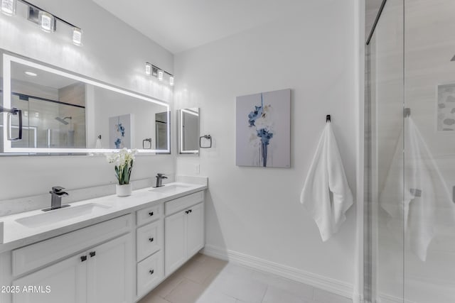 bathroom with tile patterned flooring, vanity, and a shower with door