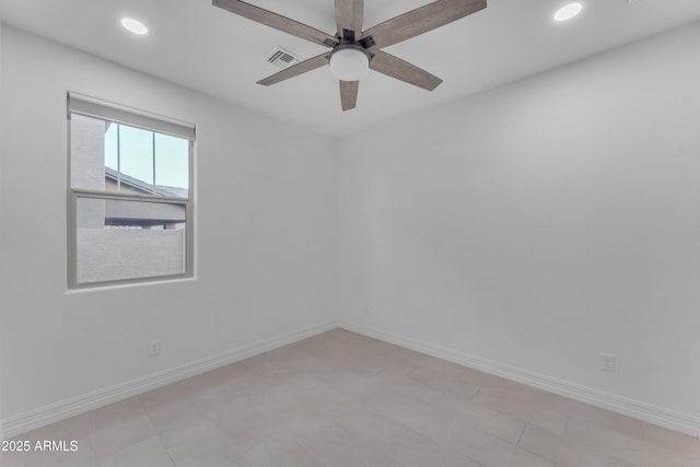 spare room featuring ceiling fan