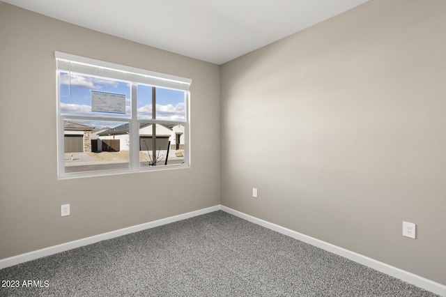 view of carpeted spare room