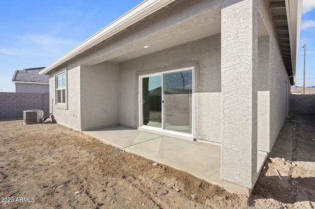 back of property featuring a patio