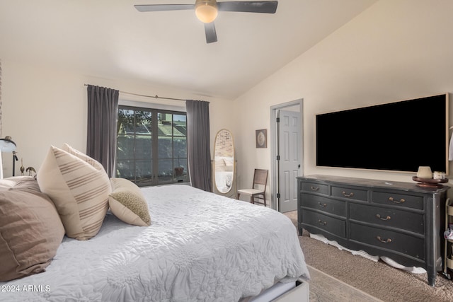 carpeted bedroom with lofted ceiling and ceiling fan