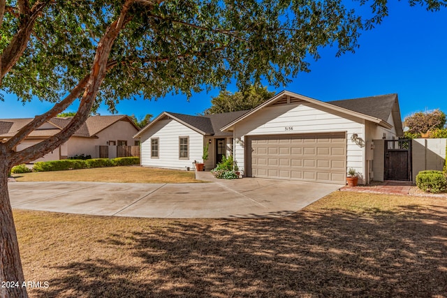 single story home featuring a garage