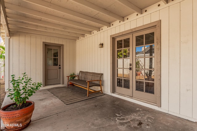 property entrance with a patio area