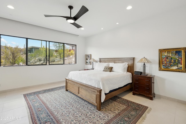 bedroom with light tile patterned floors, baseboards, a ceiling fan, and recessed lighting
